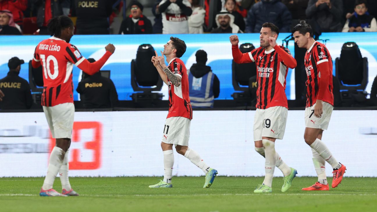 AC Milan players celebrate after scoring a goal against Inter in the Italian Super Cup.