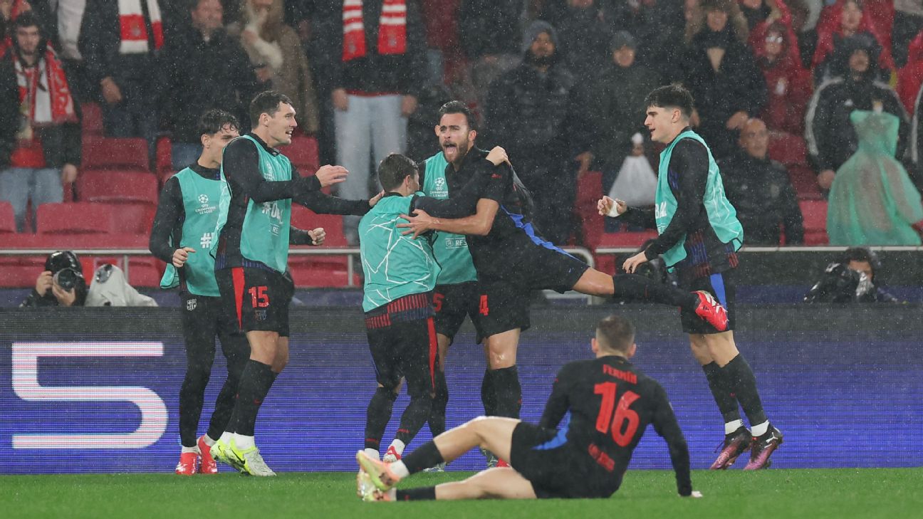 Barcelona players celebrate after scoring a goal against Benfica in the Champions League.