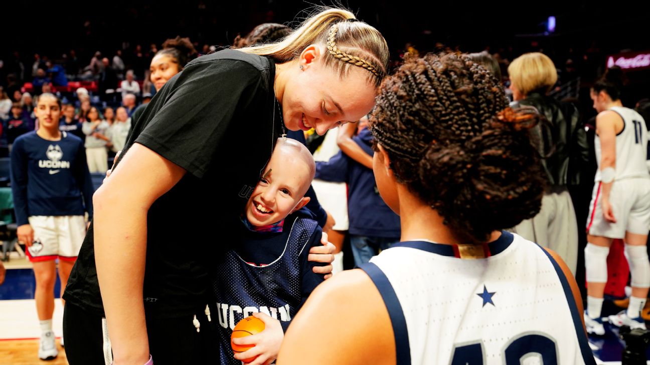 Forever Bond: The Heartwarming Friendship Between UConn Huskies and Their Youngest Fan