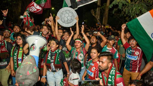 The Mohun Bagan faithful celebrate with a faux ISL League Shield. — Article image accompanying Mohun Bagan vs Chennaiyin FC in ISL Wrestling World Championships continue: Indian Sports LIVE, October 26 on WagerUp Sports News. The Mohun Bagan faithful celebrate with a faux ISL League Shield. — Article image accompanying Mohun Bagan vs Chennaiyin FC in ISL Wrestling World Championships continue: Indian Sports LIVE, October 26 on WagerUp Sports News.