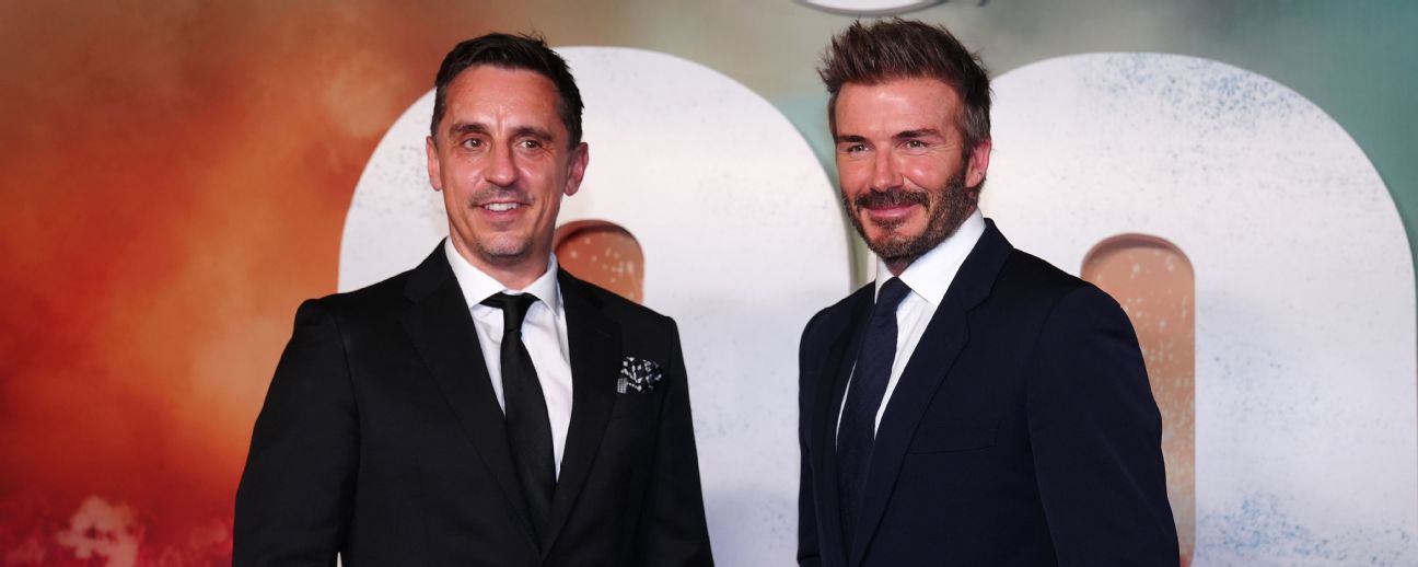 Gary Neville (left) and David Beckham arrive on the red carpet for the 99 World Premiere at the Printworks, Manchester.