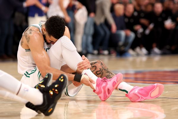 Celtics' Jayson Tatum carried off in Game 4 with leg injury