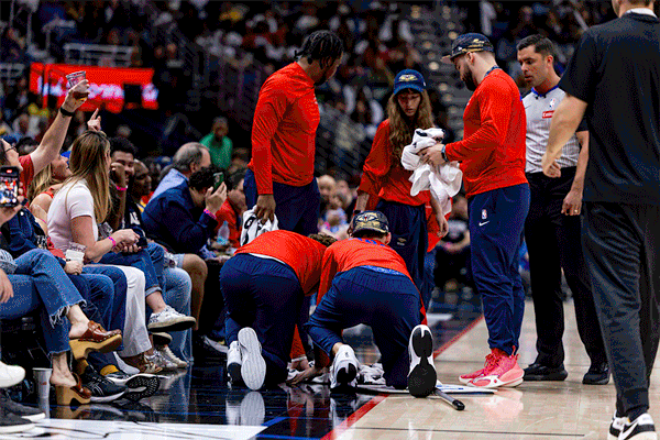 Ball boys watching for fast breaks