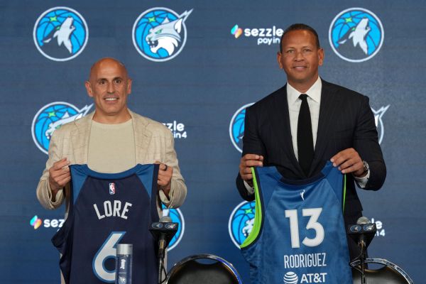 Marc Lore and Alex Rodriguez purchased the Timberwolves and WNBA's Lynx for $1.5 billion. "We want to make our fan base proud," Rodriguez said.
