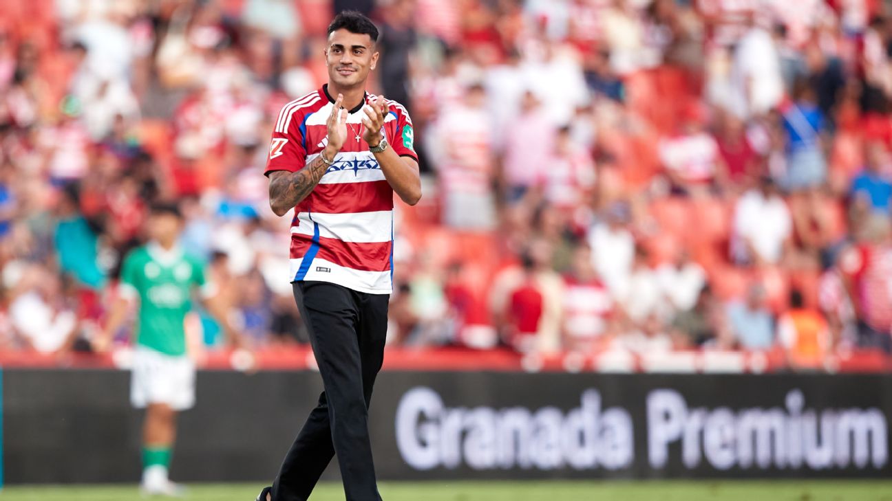 Reinier Jesus greets the fans after being presented as a new Granada CF player at half-time of the LaLiga Hypermotion match between Granada CF and SD Huesca at Nuevo Los Carmenes Stadium on August 30, 2024, in Granada, Spain