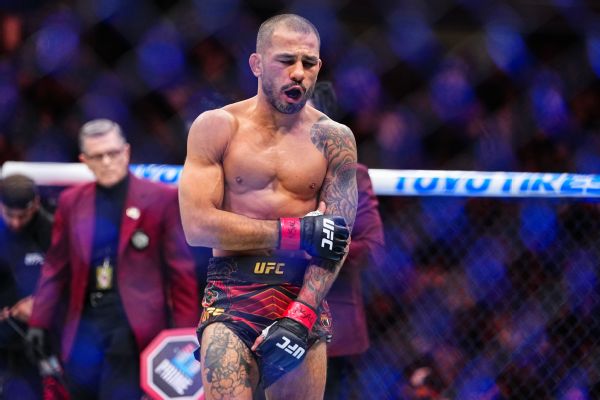 Van wins flyweight title after Pantoja injures arm at UFC 323