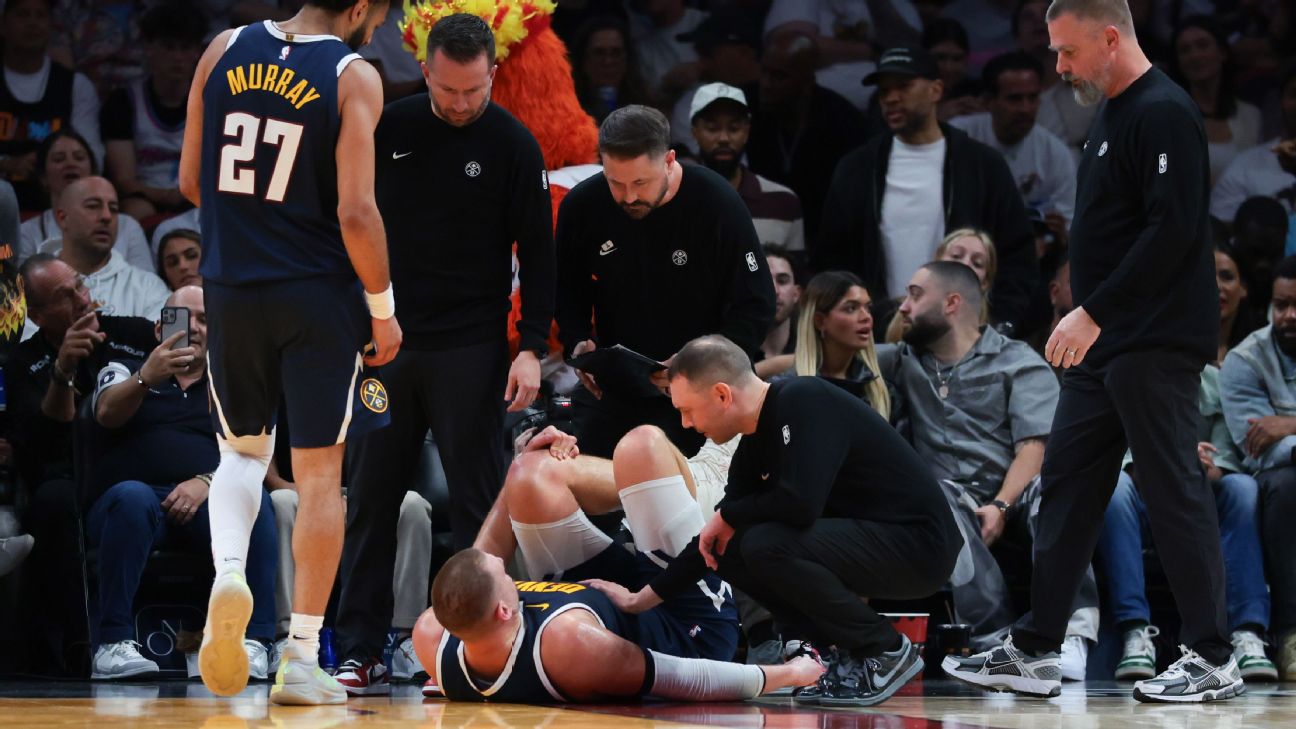 <a href="https://www.espn.com/nba/story/_/id/47449666/nuggets-nikola-jokic-injures-left-knee-limps-court-miami" target="_blank">Nuggets’ Jokic limps off court after injuring knee</a>
