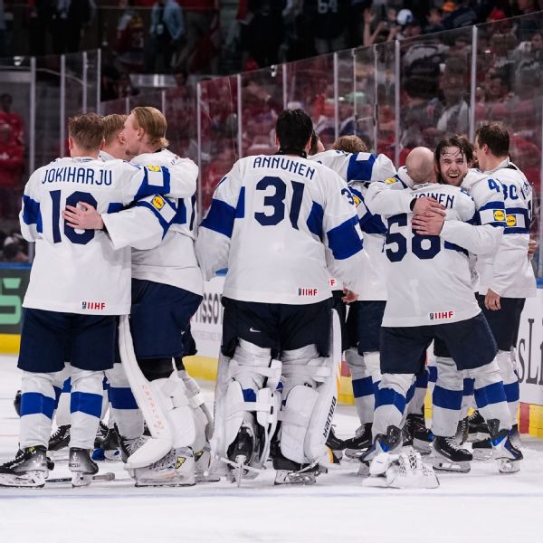 Finland clinches world championship with Helenius' OT heroics