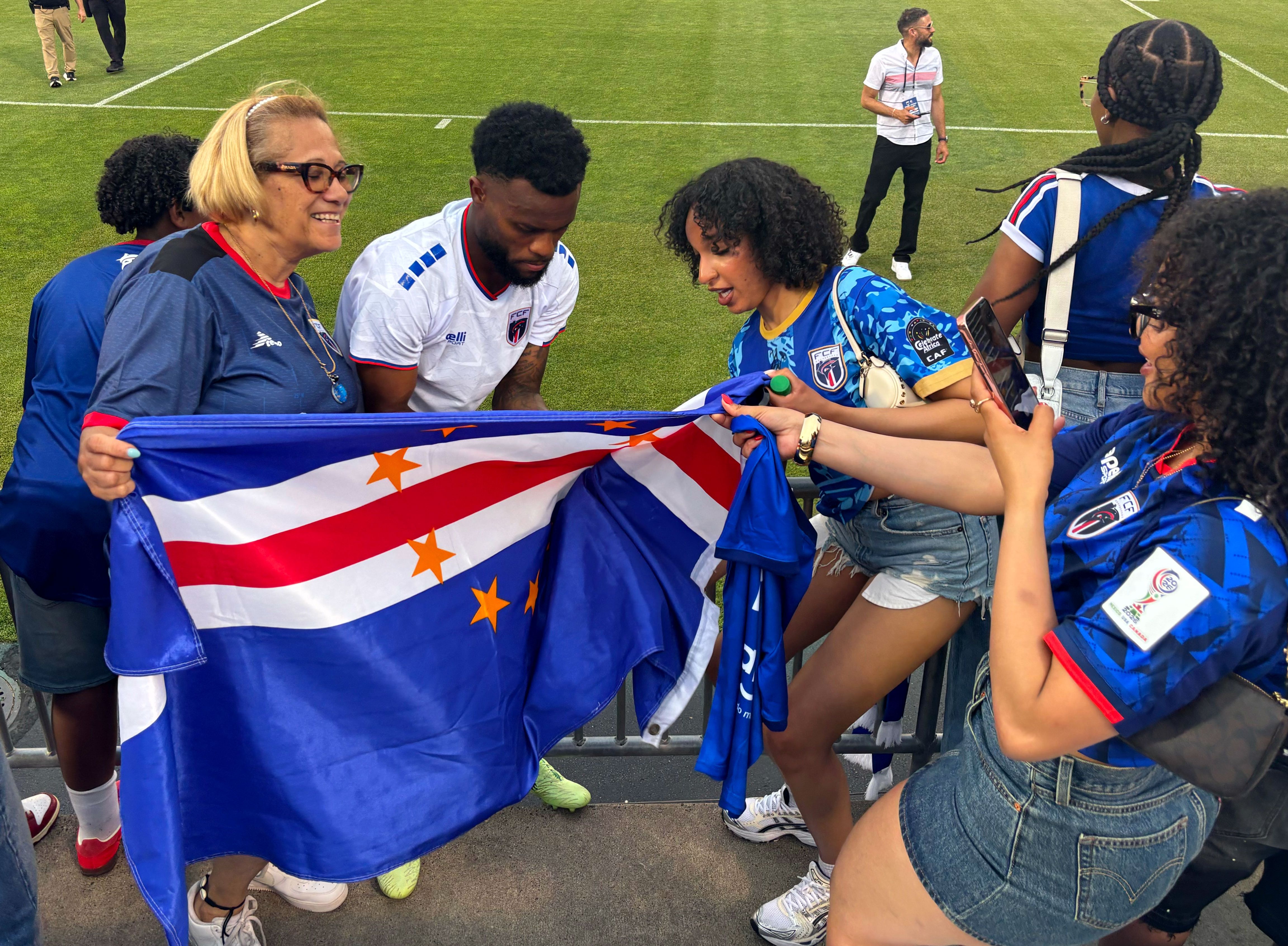 Cabo Verdean players stayed behind after a World Cup warmup match to sign autographs and pose for pictures with adoring fans.