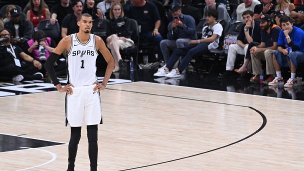 Victor Wembanyama of the San Antonio Spurs looks on during the game against the New York Knicks during Game 5 of the 2026 NBA Finals on June 13, 2026, at Frost Bank Center in San Antonio, Texas.  [608x342]