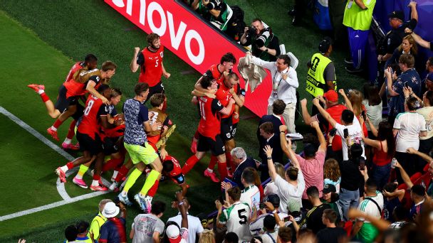 Austria celebrate Sasa Kalajdzic's late equalizing goal against Algeria.