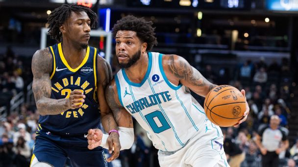 Charlotte Hornets forward Miles Bridges (0) dribbles the ball while Indiana Pacers guard Quenton Jackson (29) defends in the first half at Gainbridge Fieldhouse. [608x342]