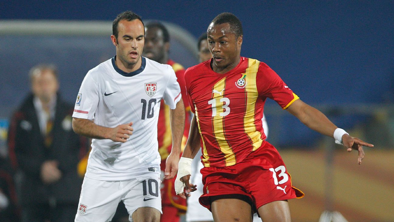 Andre Ayew takes on the USA's Landon Donovan at the 2010 FIFA World Cup in South Africa.