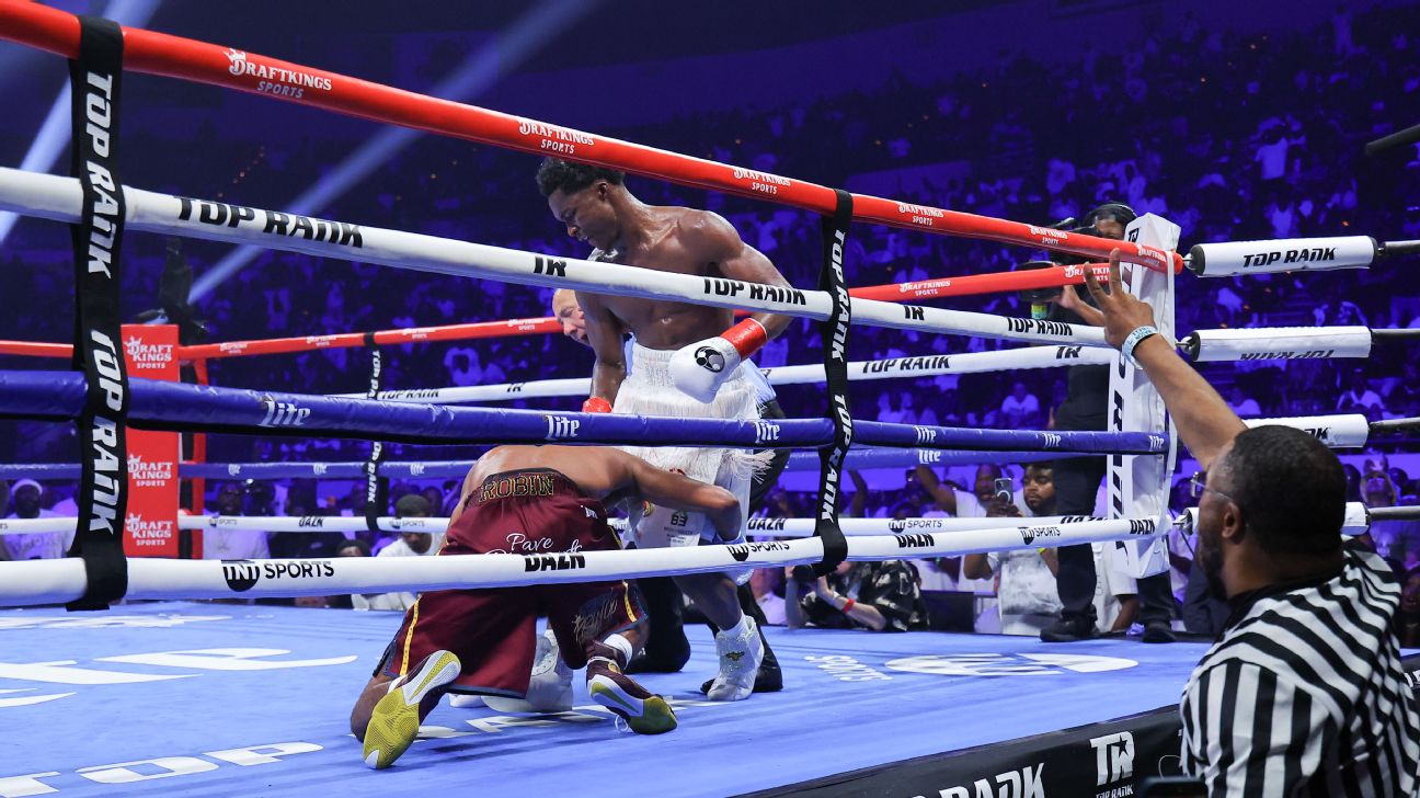 Mason retains title with dramatic 12th-round TKO