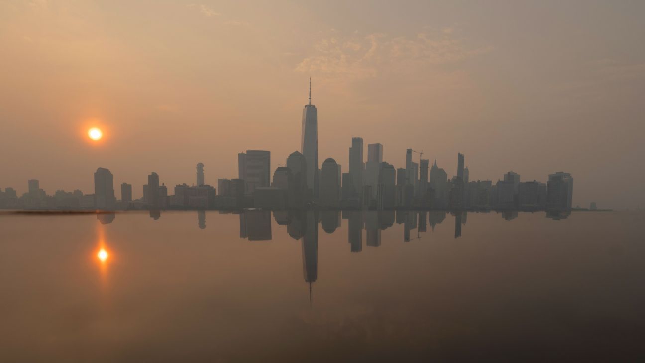 世界足球杯决赛前暴雨驱散野火烟霾　天气转好