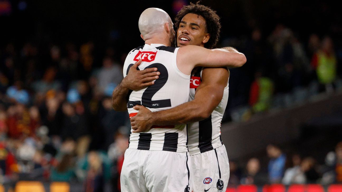 Steele Sidebottom and Isaac Quaynor embrace after Collingwood's win. — Article image accompanying 'Crossed the line': Crows boss slams fans who booed Pie on WagerUp Sports News. Steele Sidebottom and Isaac Quaynor embrace after Collingwood's win. — Article image accompanying 'Crossed the line': Crows boss slams fans who booed Pie on WagerUp Sports News.