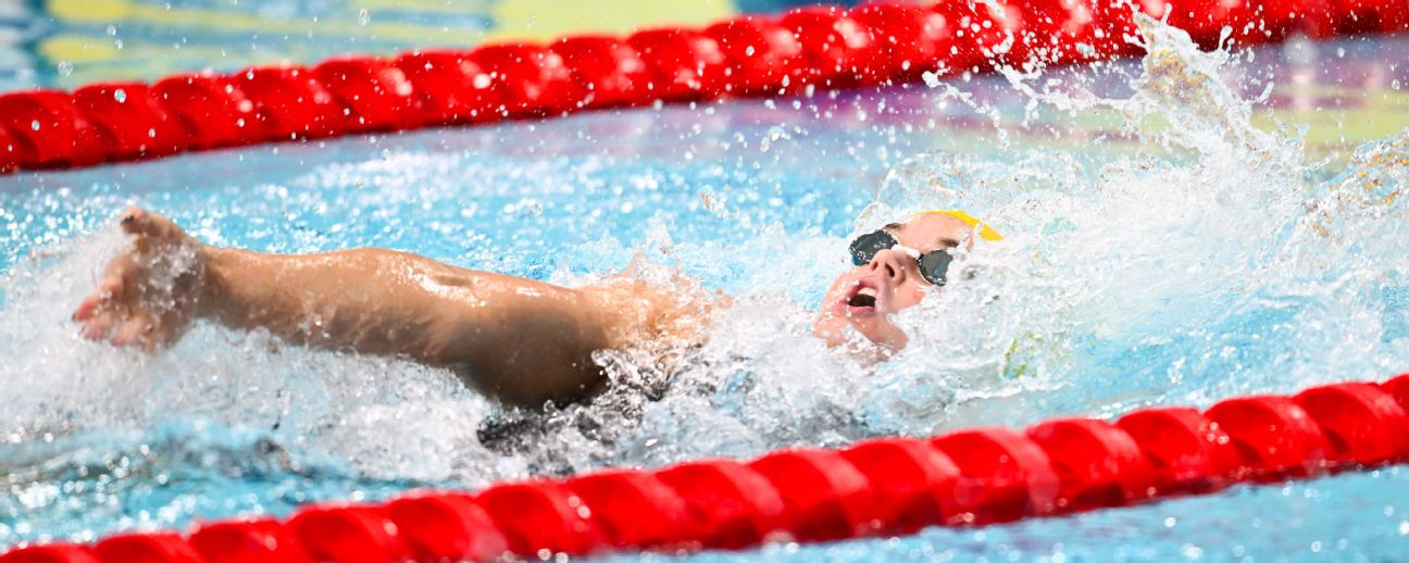 Iona Alexandra Anderson on her way to winning gold in the women's 100m backstroke final. — Article image accompanying Games records fall as Aussie swimmers bank more gold on WagerUp Sports News. Iona Alexandra Anderson on her way to winning gold in the women's 100m backstroke final. — Article image accompanying Games records fall as Aussie swimmers bank more gold on WagerUp Sports News.