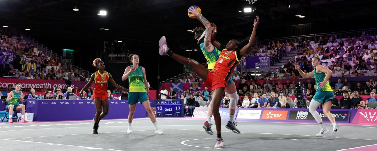 Marena Whittle of Team Australia jumps for the ball while under pressure from Melissa Akullu of Team Uganda during the Women's 3x3 gold medal final. — Article image accompanying Women win 3x3 gold as Wombats defend Games title on WagerUp Sports News. Marena Whittle of Team Australia jumps for the ball while under pressure from Melissa Akullu of Team Uganda during the Women's 3x3 gold medal final. — Article image accompanying Women win 3x3 gold as Wombats defend Games title on WagerUp Sports News.