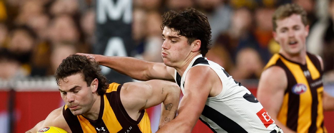 Nick Watson of the Hawks is tackled by Sam Swadling of the Magpies — Article image accompanying Yet Moore MCG drama as Magpies, Hawks draw again on WagerUp Sports News. Nick Watson of the Hawks is tackled by Sam Swadling of the Magpies — Article image accompanying Yet Moore MCG drama as Magpies, Hawks draw again on WagerUp Sports News.