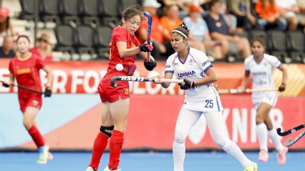 Jinzhuang Tan of China (R) in a duel with Navneet Kaur of India — Article image accompanying India hold favourites China to 2-2 draw in FIH Women's Hockey World Cup opener on WagerUp Sports News. Jinzhuang Tan of China (R) in a duel with Navneet Kaur of India — Article image accompanying India hold favourites China to 2-2 draw in FIH Women's Hockey World Cup opener on WagerUp Sports News.