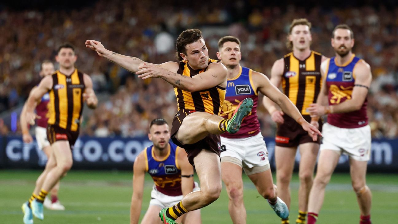 Nick Watson of the Hawks kicks the ball — Article image accompanying Brisbane Lions make fourth-straight Grand Final in incredible MCG scenes on WagerUp Sports News. Nick Watson of the Hawks kicks the ball — Article image accompanying Brisbane Lions make fourth-straight Grand Final in incredible MCG scenes on WagerUp Sports News.