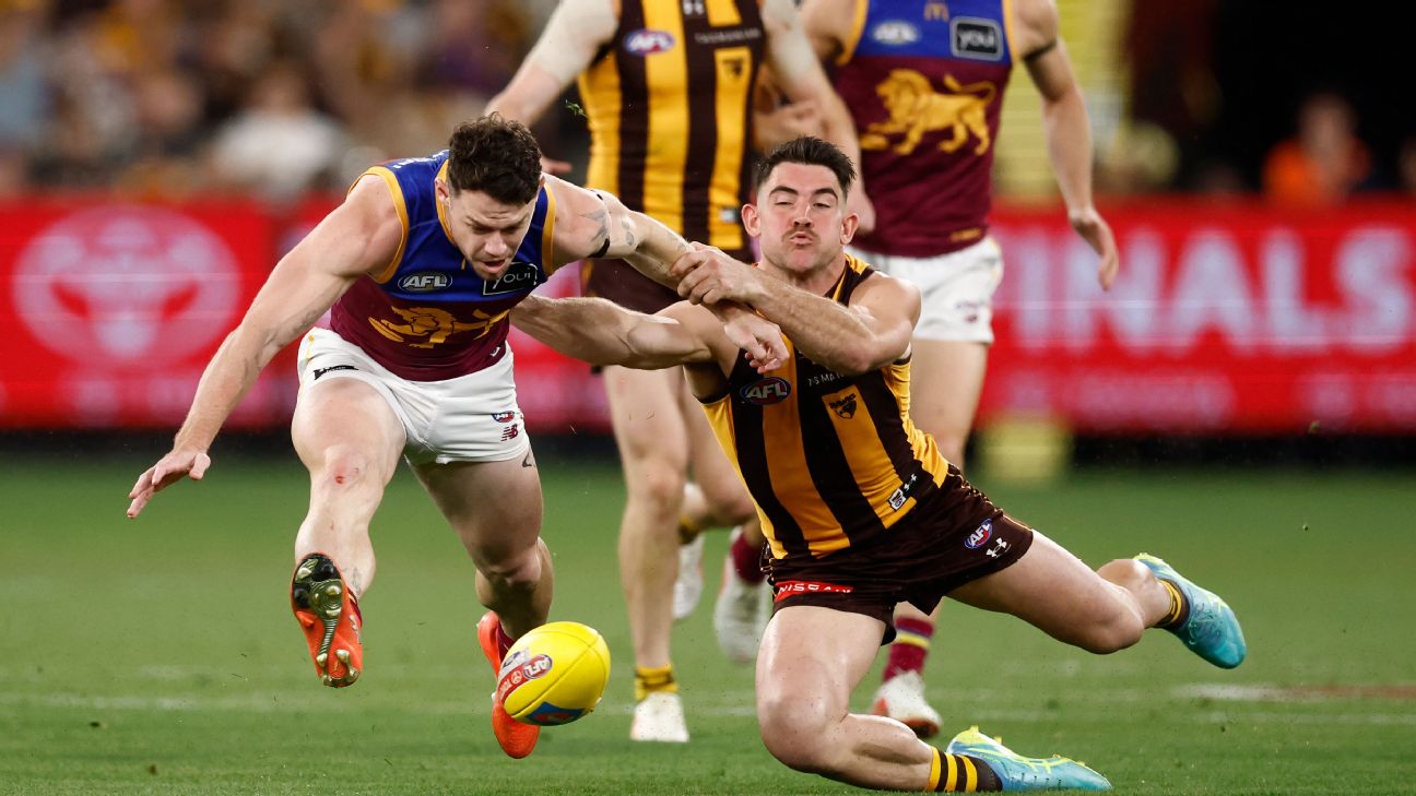 Lachie Neale of the Lions is tackled by Jai Newcombe of the Hawks — Article image accompanying Lions to challenge Lachie Neale's AFL Grand Final ban on WagerUp Sports News. Lachie Neale of the Lions is tackled by Jai Newcombe of the Hawks — Article image accompanying Lions to challenge Lachie Neale's AFL Grand Final ban on WagerUp Sports News.