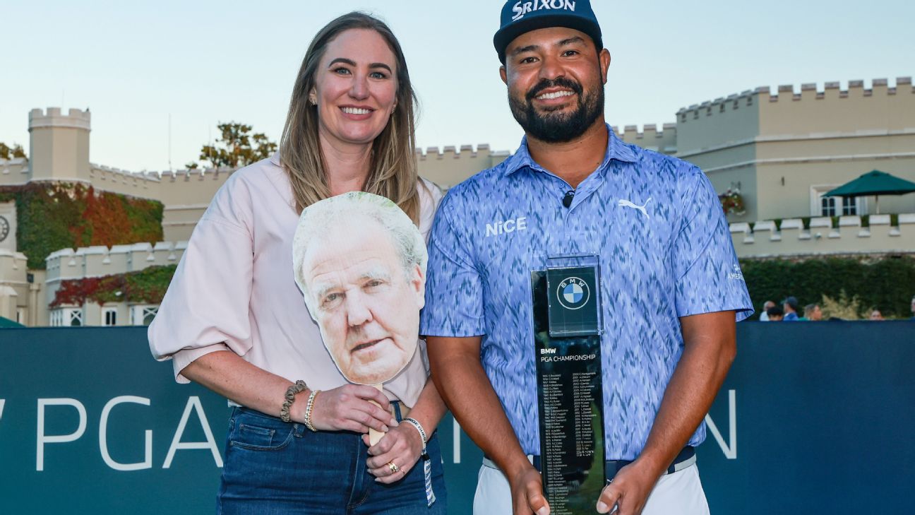 J.J. Spaun poses with the BMW PGA Championship trophy and his wife, Melody, who holds a cut-out of Jeremy Clarkson. — Article image accompanying How Jeremy Clarkson helped J.J. Spaun beat Rory McIlroy at the BMW Championship on WagerUp Sports News. J.J. Spaun poses with the BMW PGA Championship trophy and his wife, Melody, who holds a cut-out of Jeremy Clarkson. — Article image accompanying How Jeremy Clarkson helped J.J. Spaun beat Rory McIlroy at the BMW Championship on WagerUp Sports News.