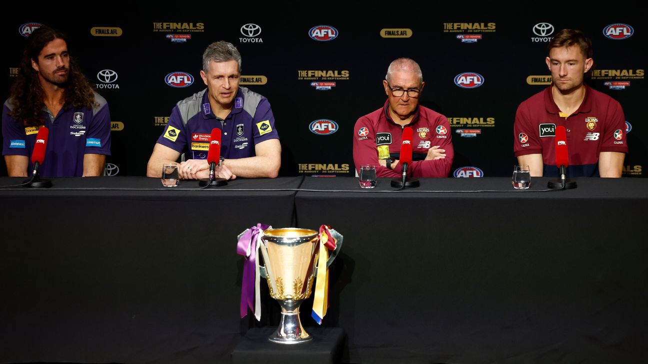 Justin Longmuir of the Dockers and Chris Fagan of the Lions at a press conference before the 2026 AFL Grand Final. — Article image accompanying Fagan rejoices, Longmuir 'cynical' as Neale beats ban on WagerUp Sports News.