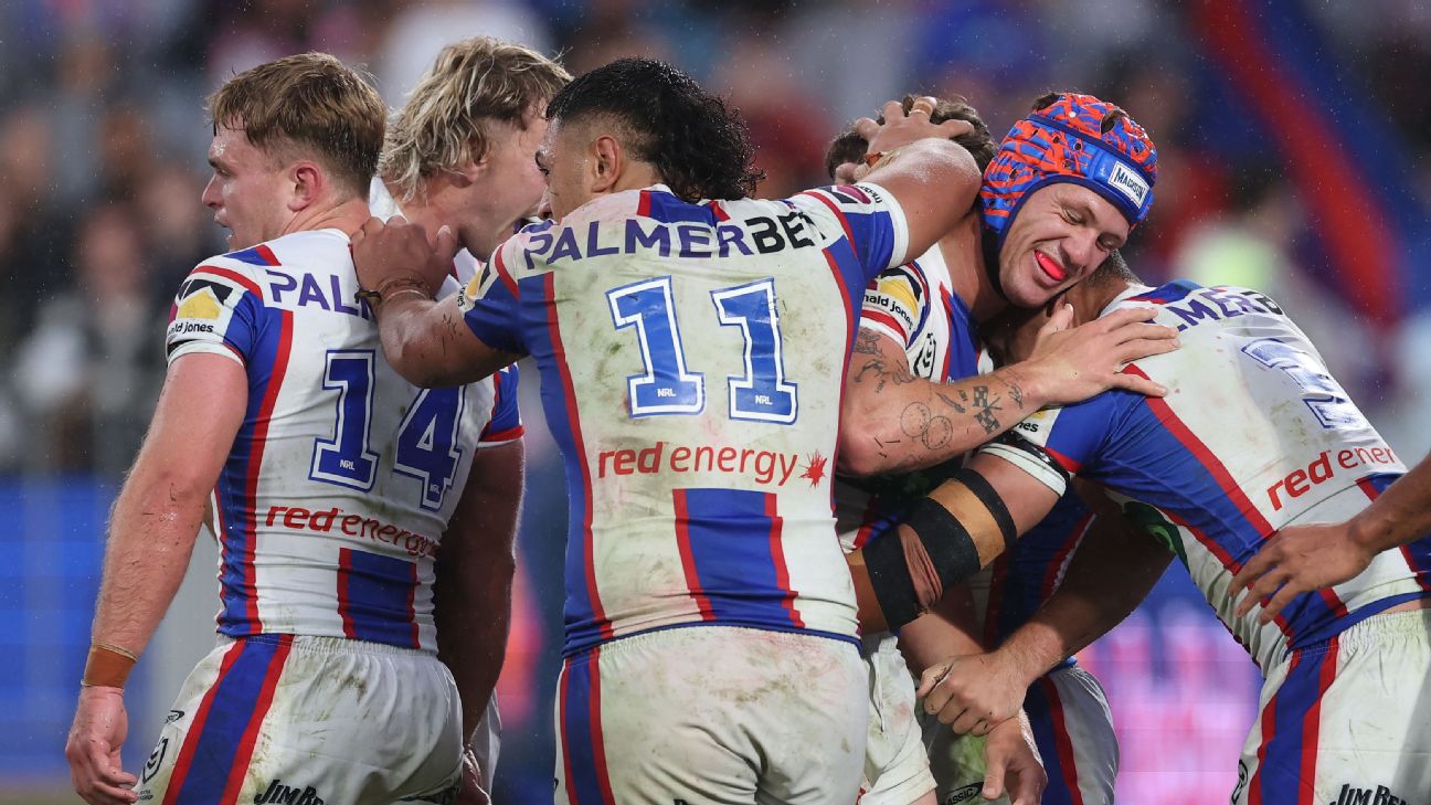 Sandon Smith (obscured) of the Knights celebrates scoring a try with teammates — Article image accompanying Newcastle Knights claim huge victory to earn first Grand Final spot in 25 years on WagerUp Sports News. Sandon Smith (obscured) of the Knights celebrates scoring a try with teammates — Article image accompanying Newcastle Knights claim huge victory to earn first Grand Final spot in 25 years on WagerUp Sports News.