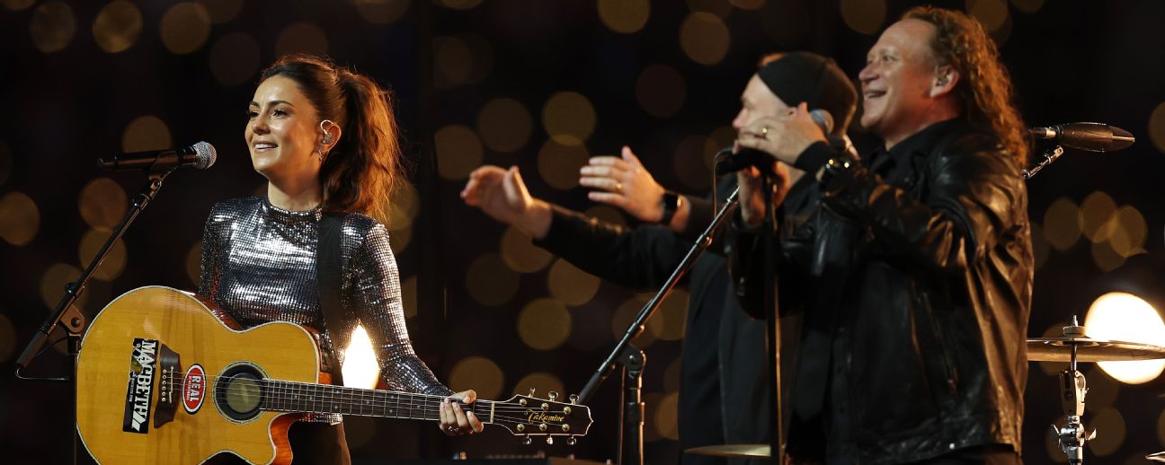 Amy Shark and Dave Gleeson perform before the NTL Grand Final. — Article image accompanying Grand Final show still strikes right note with fans on WagerUp Sports News. Amy Shark and Dave Gleeson perform before the NTL Grand Final. — Article image accompanying Grand Final show still strikes right note with fans on WagerUp Sports News.