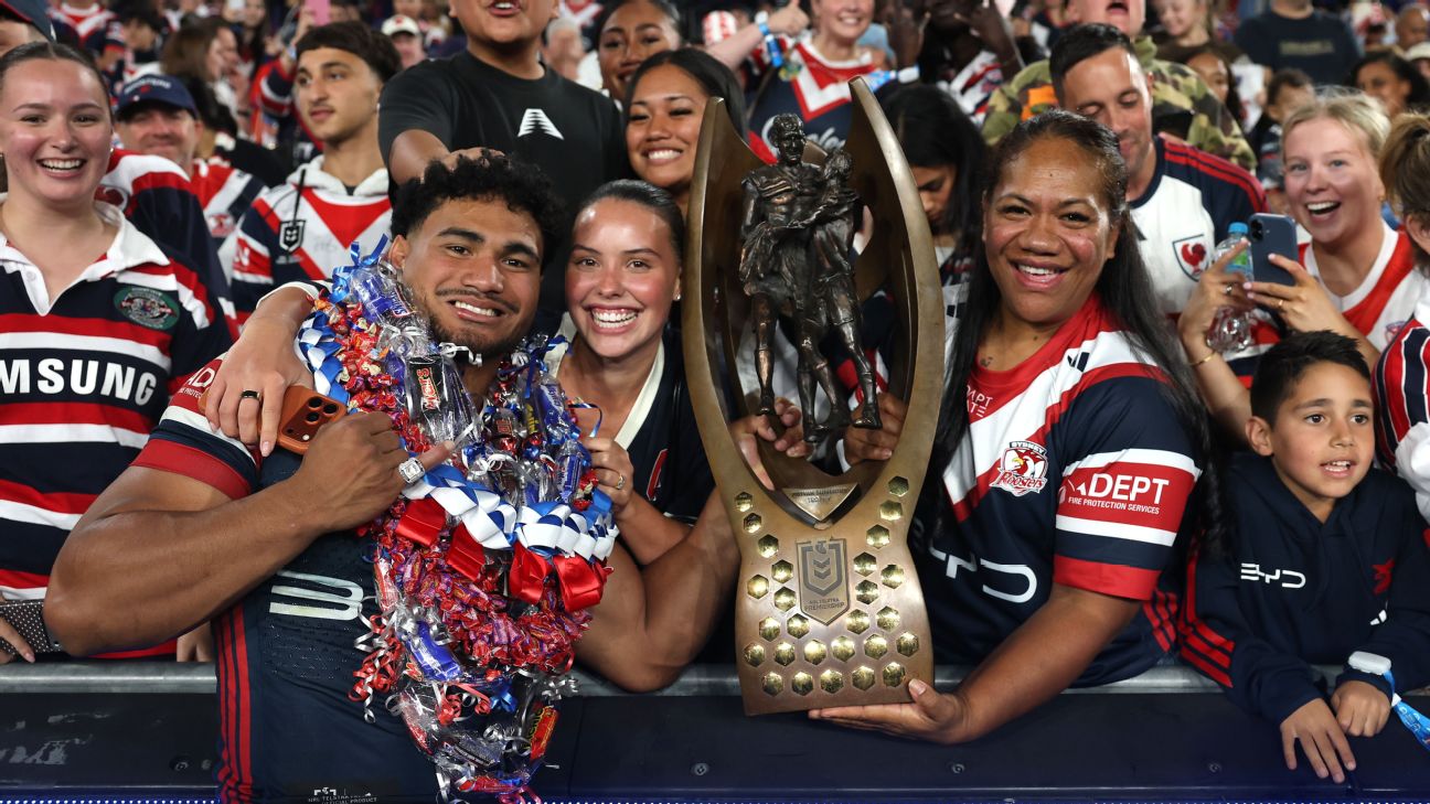 Robert Toia of the Roosters celebrates with family, friends, and the Provan-Summons Trophy. — Article image accompanying Toia backs himself among NRL's best centres after premiership triumph on WagerUp Sports News. Robert Toia of the Roosters celebrates with family, friends, and the Provan-Summons Trophy. — Article image accompanying Toia backs himself among NRL's best centres after premiership triumph on WagerUp Sports News.