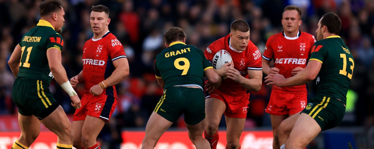 Morgan Smithies of England runs towards Harry Grant and Isaah Yeo of Australia in 2025. — Article image accompanying World Cup blow for England as injury scuppers NRL star on WagerUp Sports News.
