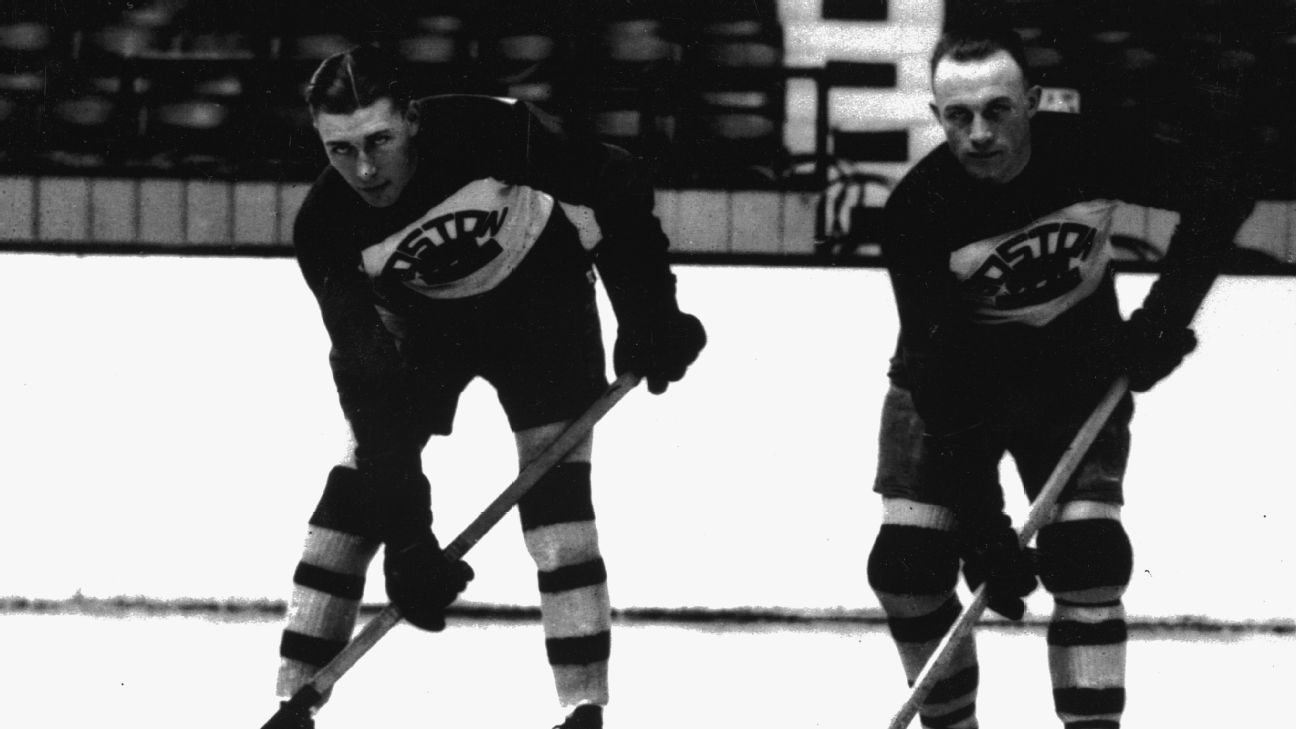Hockey players -- like the Bruins' Dit Clapper, left, and Eddie Shore -- looked quite a bit different 100 years ago.