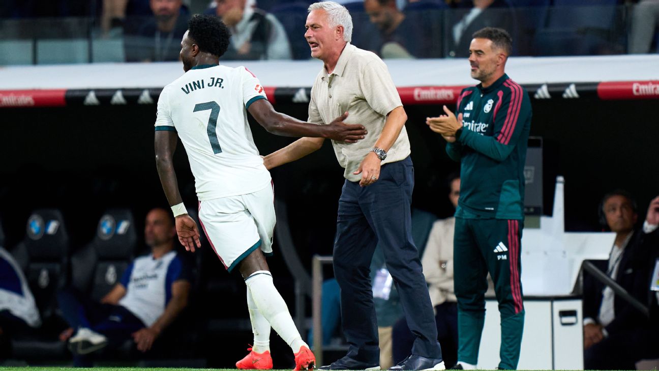 Vinicius Junior of Real Madrid celebrates with José Mourinho, Head Coach of Real Madrid, after scoring their team's third goal during the LaLiga EA Sports 2026/27 match between Rea