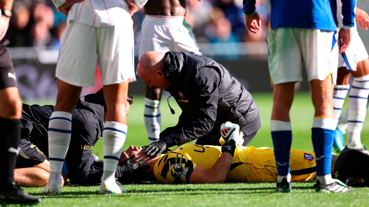 Emiliano Martinez of Chelsea receives treatment during the Premier League 2026/27 match between Everton and Chelsea FC at Hill Dickinson Stadium