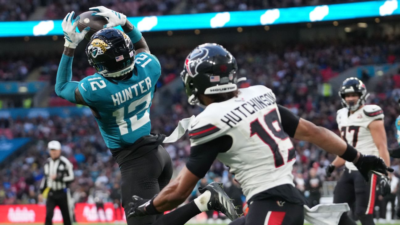 Travis Hunter starred on both sides of the ball Sunday, recording an interception (seen here) -- and a touchdown catch in the Jaguars' 34-31 loss in London. — Article image accompanying Travis Hunter stars in Jaguars' loss, is 1st with INT and TD catch since 2002 on WagerUp Sports News. Travis Hunter starred on both sides of the ball Sunday, recording an interception (seen here) -- and a touchdown catch in the Jaguars' 34-31 loss in London. — Article image accompanying Travis Hunter stars in Jaguars' loss, is 1st with INT and TD catch since 2002 on WagerUp Sports News.